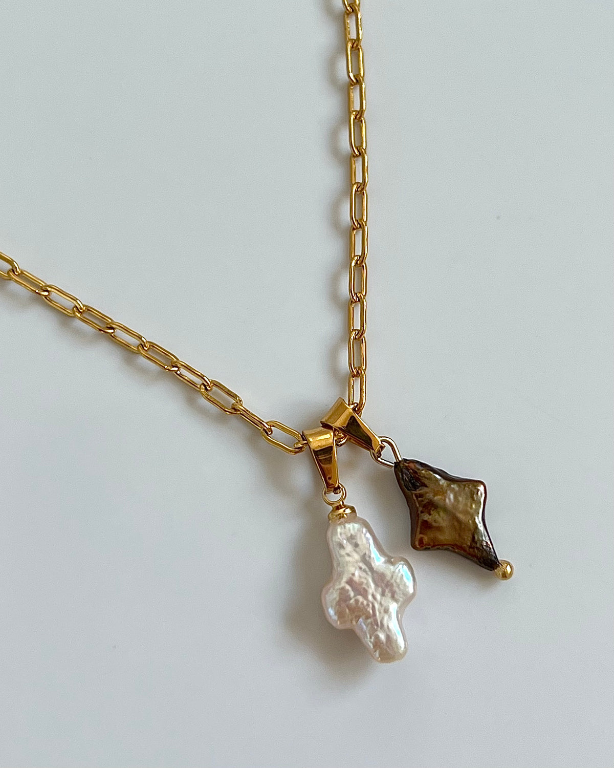 Pearl cross and diamond necklace